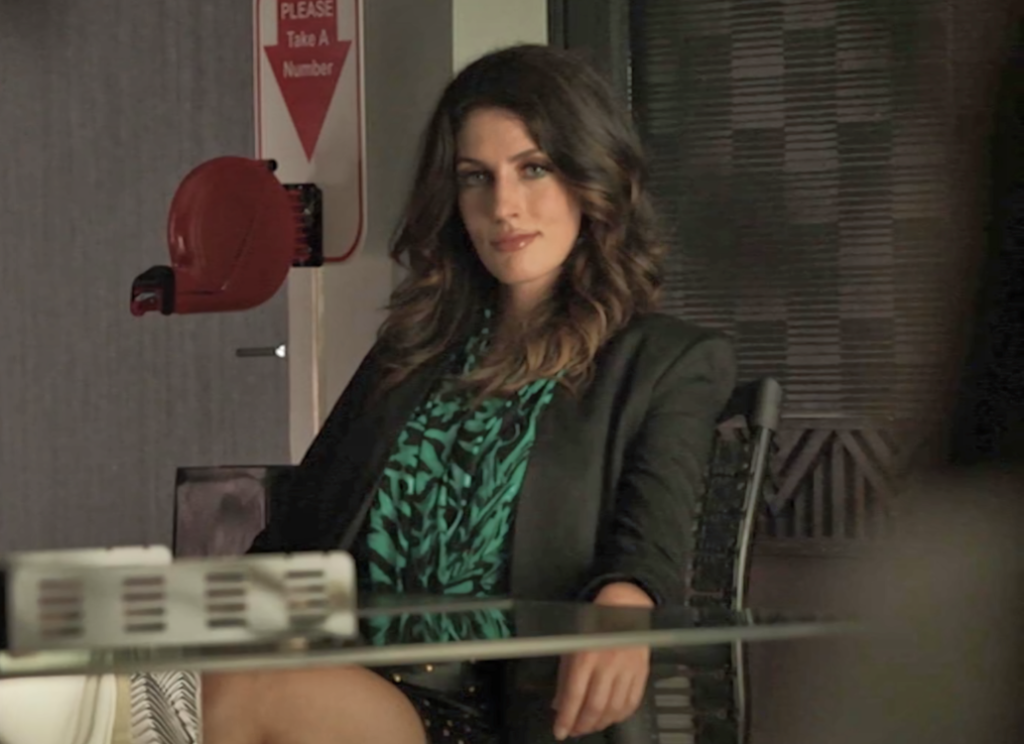 Jessica Huras as the Morrigan’s receptionist. - Lost Girl 405