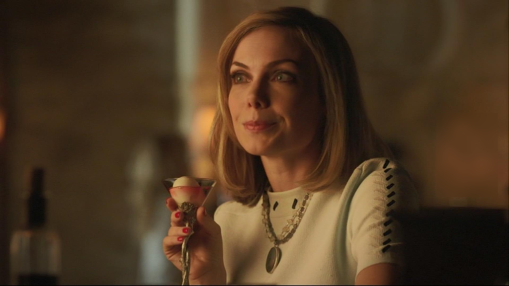 Amanda Walsh as Zee, sipping a coquatiel at the Dal - Lost Girl 506