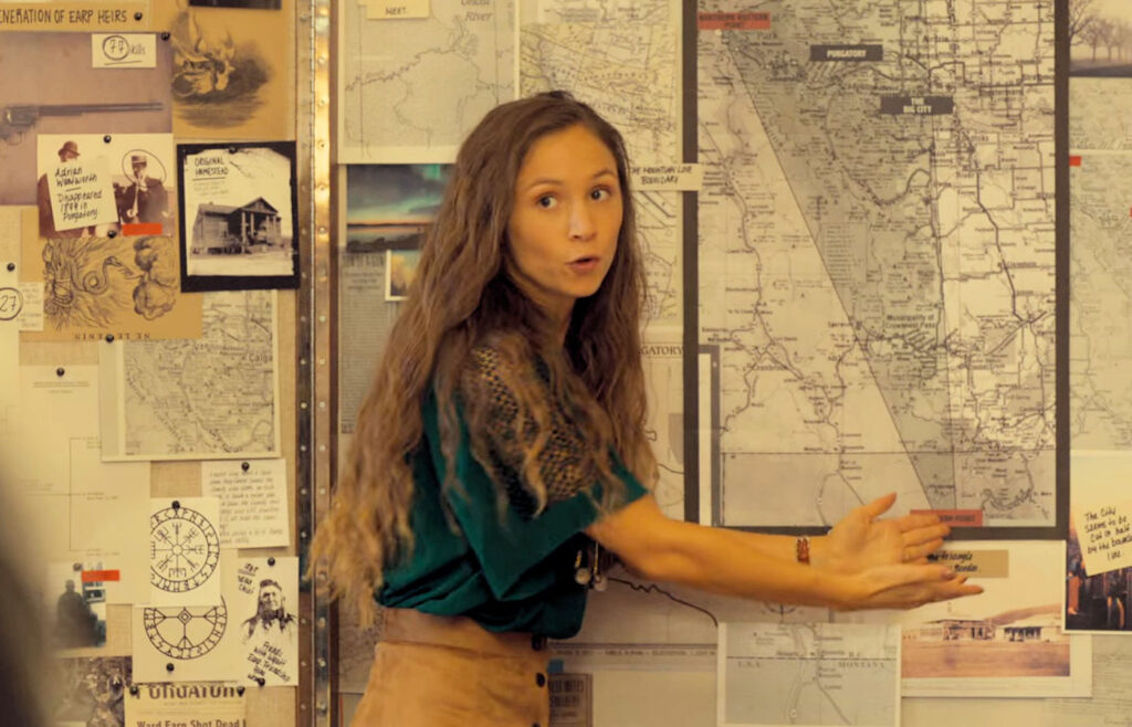 Dominique Provost-Chalkley as Waverly with her map of the Ghost River Triangle - Wynonna Earp 103