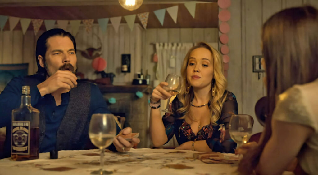 Tim Rozon as Doc Holliday and Siobhan Williams as Steph preparing to play poker - Wynonna Earp 107