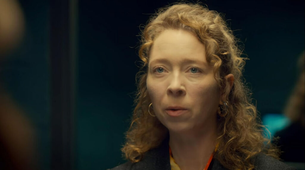 Shawna Burnett as the interviewer from Black Badge sent to evaluate Wynonna - Wynonna Earp 109