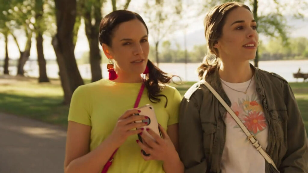 Elise Gatien as Lena and Stephanie Izak as Ava in the romantic comedy 'Love is Where You Find It'