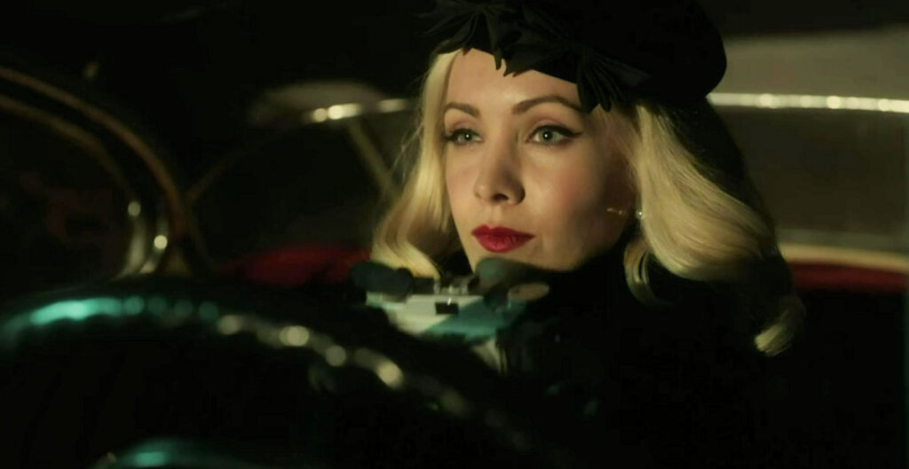 Ksenia Solo as Susie Miller spying on the Hyneks from her car with a camera- Project Blue Book 101