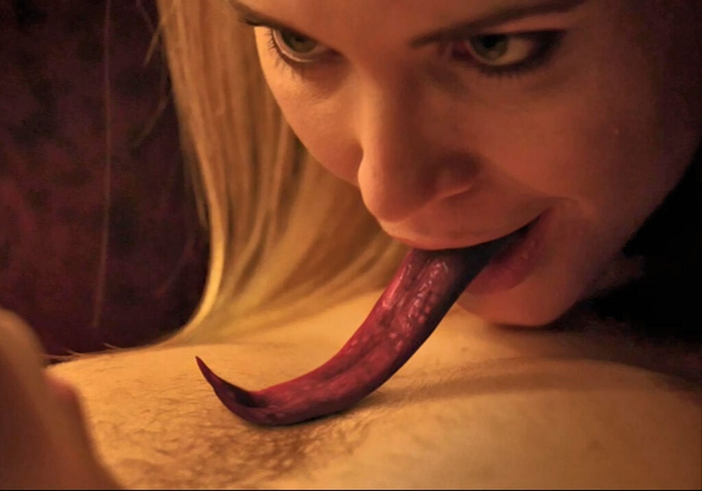 Kat (Sophia Troop) distracts Mark (Luke Bilyk) with her tongue - Lost Girl 505