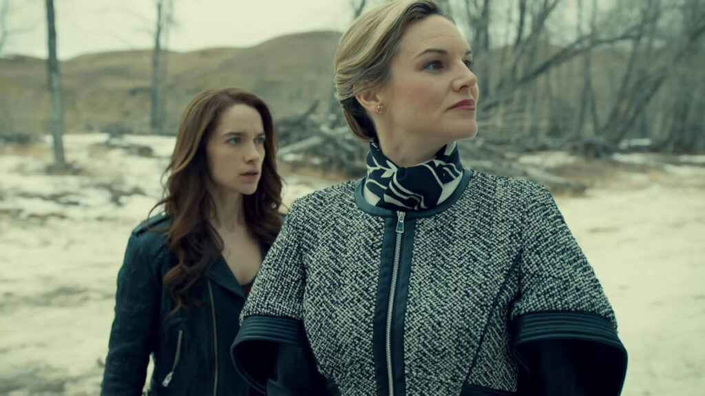 Melanie Scrofano as Wynonna and Kate Drummond as Black Badge Agent Jeannie Lucado - Wynonna Earp 113