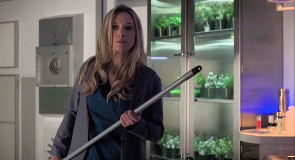 Zoie Palmer as Dr Lauren Lewis with broom - Lost Girl 503