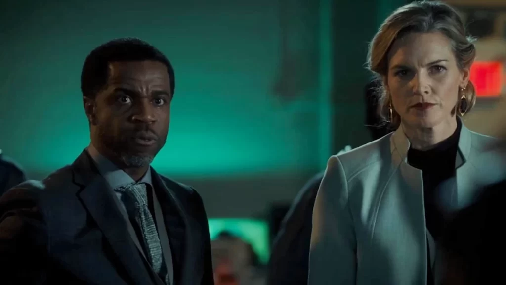 Kevin Hanchard as Moody and Kate Drummond as Agent Lucado - Wynonna Earp 201