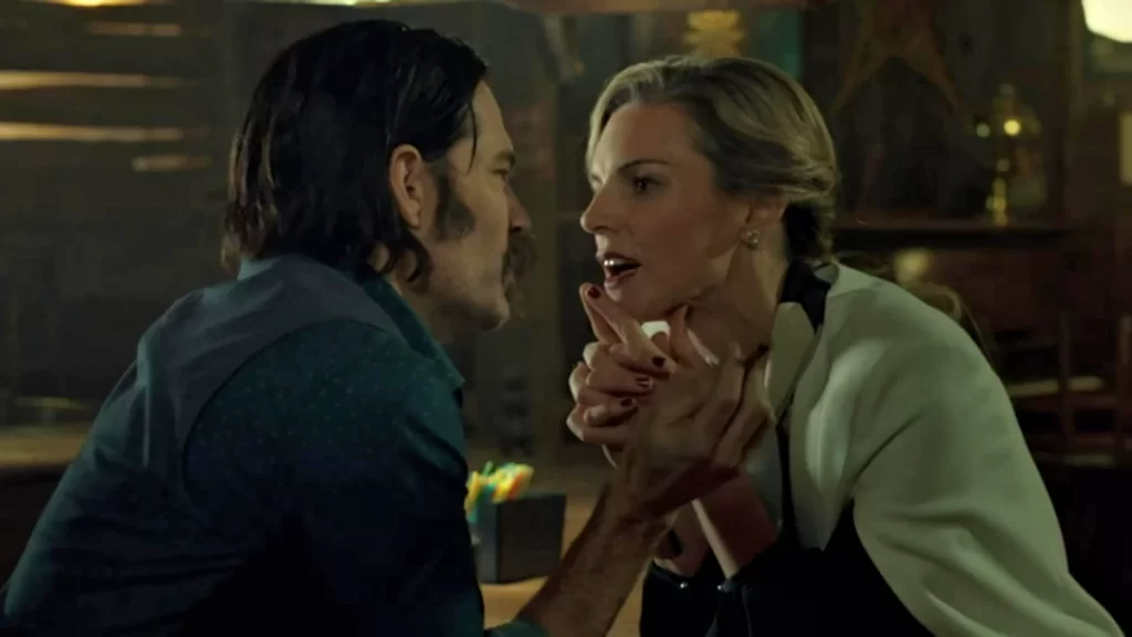 Tim Rozon as Doc Holliday and Kate Drummond as Agent Jeannie Lucado - Wynonna Earp 202