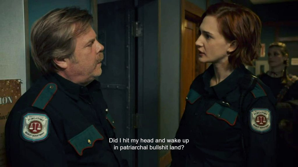 Officer Haught (Kat Barrell) asks Sheriff Nedley (Greg Lawson) a question - Wynonna Earp 203