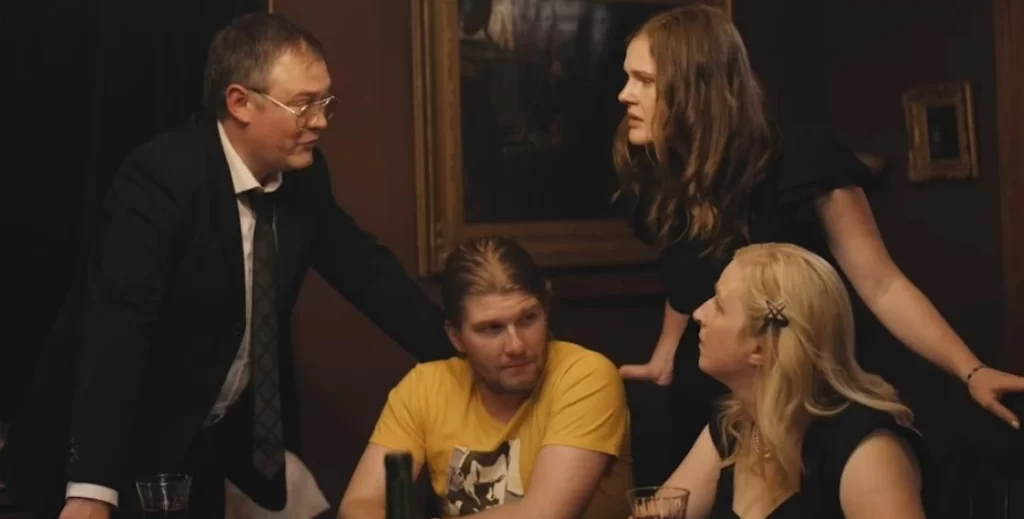 Madison Nyenhuis (unnamed attendee at the Blue Devils' pep rally in Wynonna Earp episode 203), Morgan LeBlanc, Cody Parker, and Miriam Anderson in 'Connecting Flights'