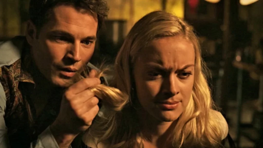 Massimo (Tim Rozon) prepares to remove a lock of hair from Tamsin (Rachel Skarsten) - Lost Girl 404