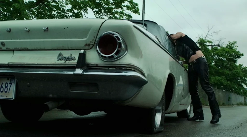 Vex (Paul Amos) and the old mid-size Chrysler - Lost Girl 402