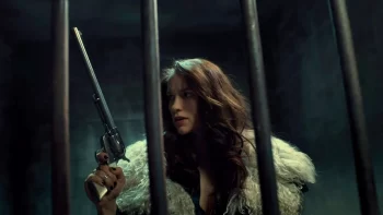 Melanie Scrofano in jail cell with peacemaker - Wynonna Earp 205