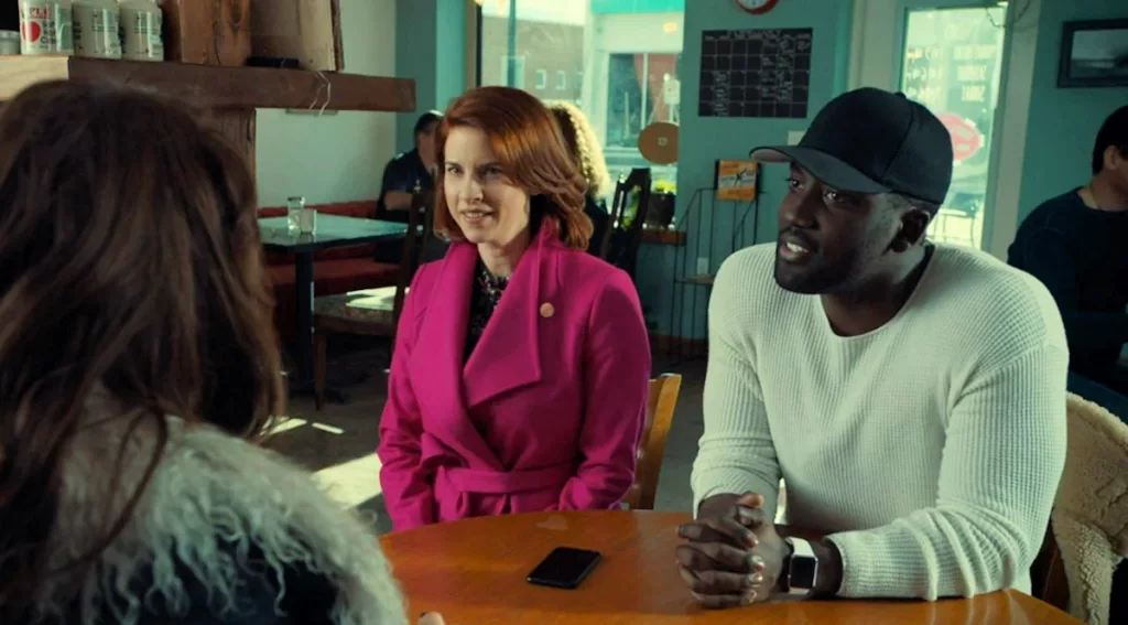 Dani Kind as the Widow Mercedes and Shamier Anderson as Agent Xavier Dolls - Wynonna Earp