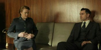 Michael Malarkey as Captain Quinn and Jill Morrison as Project Blue Book secretary Faye - Project Blue Book 109