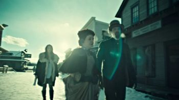 Wynonna hears two townsfolk (Caitlynne Medrek and Trevor John Campbell) talking about Sheriff Clootie's wives - Wynonna Earp 208