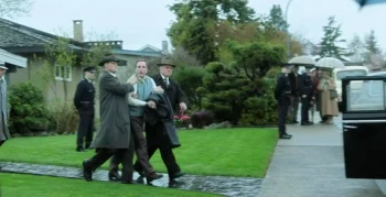 Donna's husband Jack (Kurt Evans) being led away by FBi agents - Project Blue Book 110