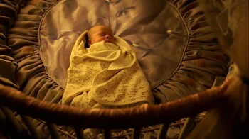 Bo as an infant. A male voice, likely her father, calls her Ysabeau - Lost Girl 309