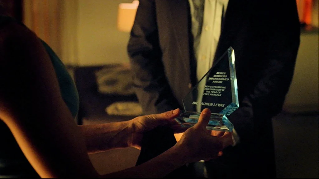Lauren's award, brought to her by Dr. Taft - Lost Girl 308