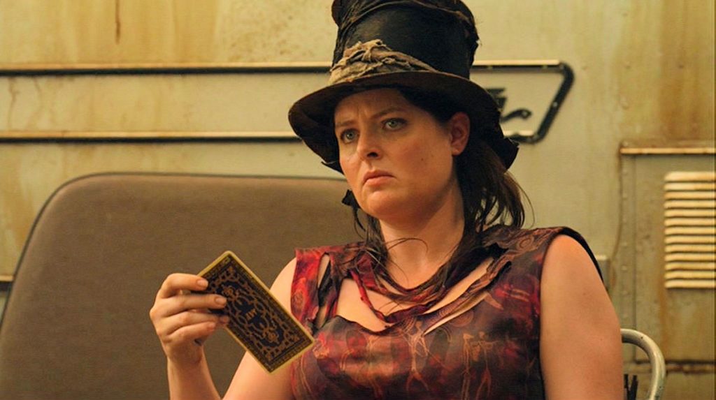 The Landlady (Lauren Ash) looks at the card drawn by Bo - Lost Girl 308