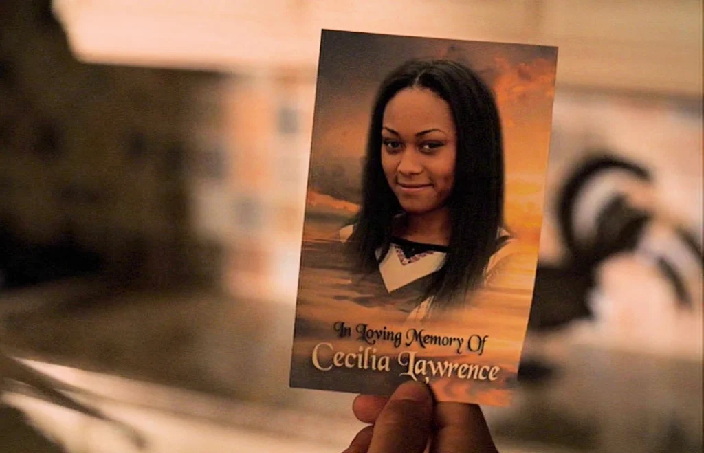 Card that says: 'In loving memory of Cecilia Lawrence' - Lost Girl 508