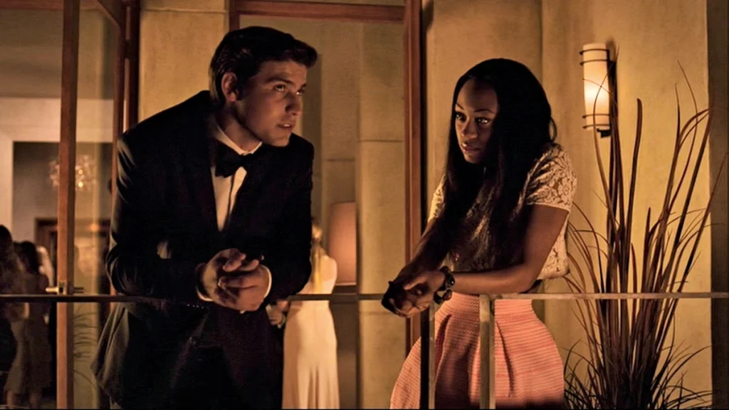 Mark (Luke Bilyk) and Iris (Shanice Banton) talk on Zee's balcony - Lost Girl 508