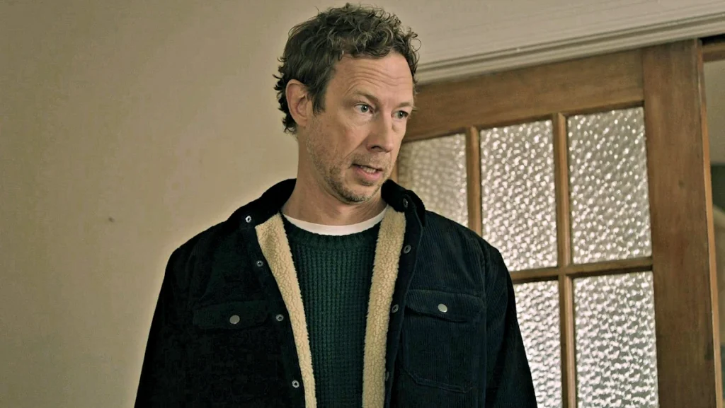 Kris Holden-Ried as realtor Ken Armstrong - The Dogs