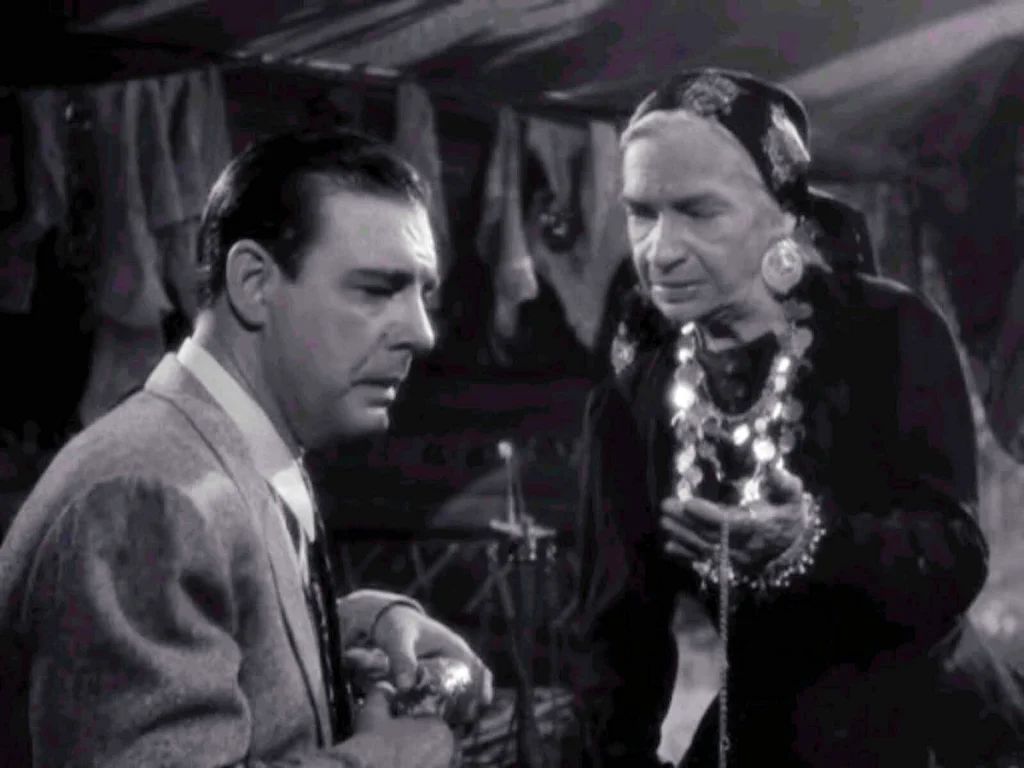 Maria Ouspenskaya as Maleva and Claude Rains as Sir John Talbot - The Wolf Man