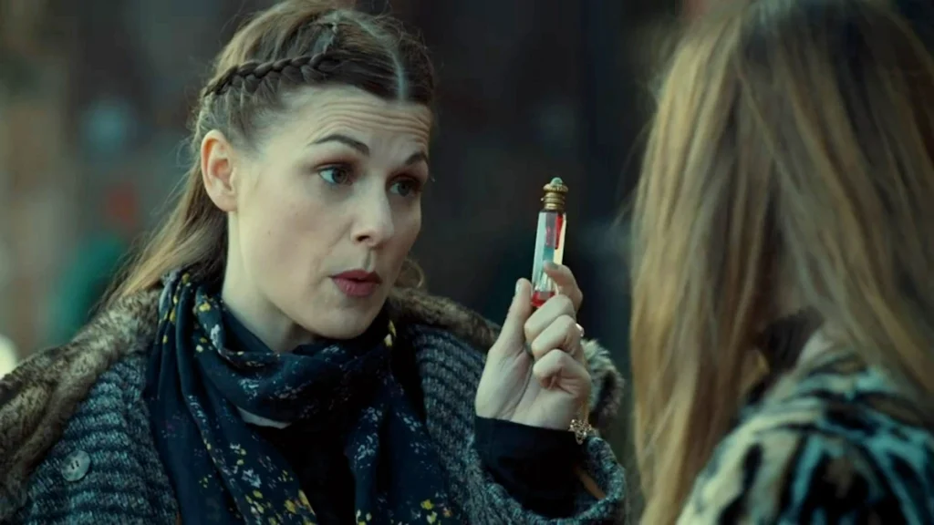 Faux Beth (Meghan Heffern) shows Waverly a phial of anti-venom - Wynonna Earp 210